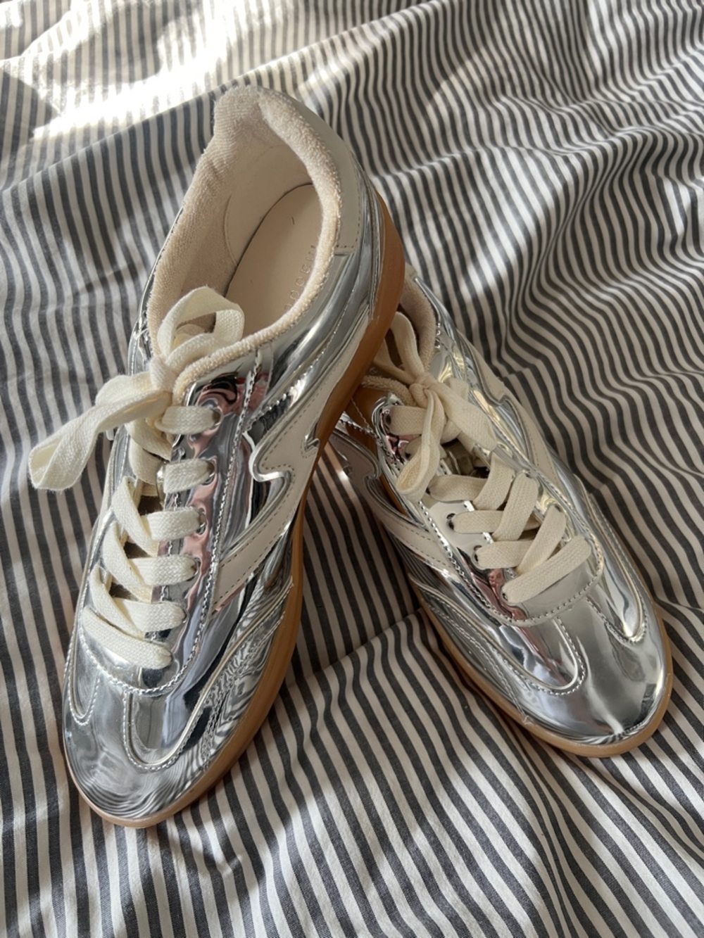 NWOT Madden Girl Silver metallic sneakers with white swoosh never worn
